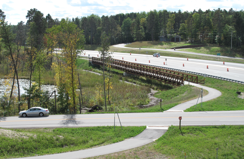 Photo of the State Paul Bunyan Trail bridge along northbound Hwy 371 and connected to Wilderness Rd.