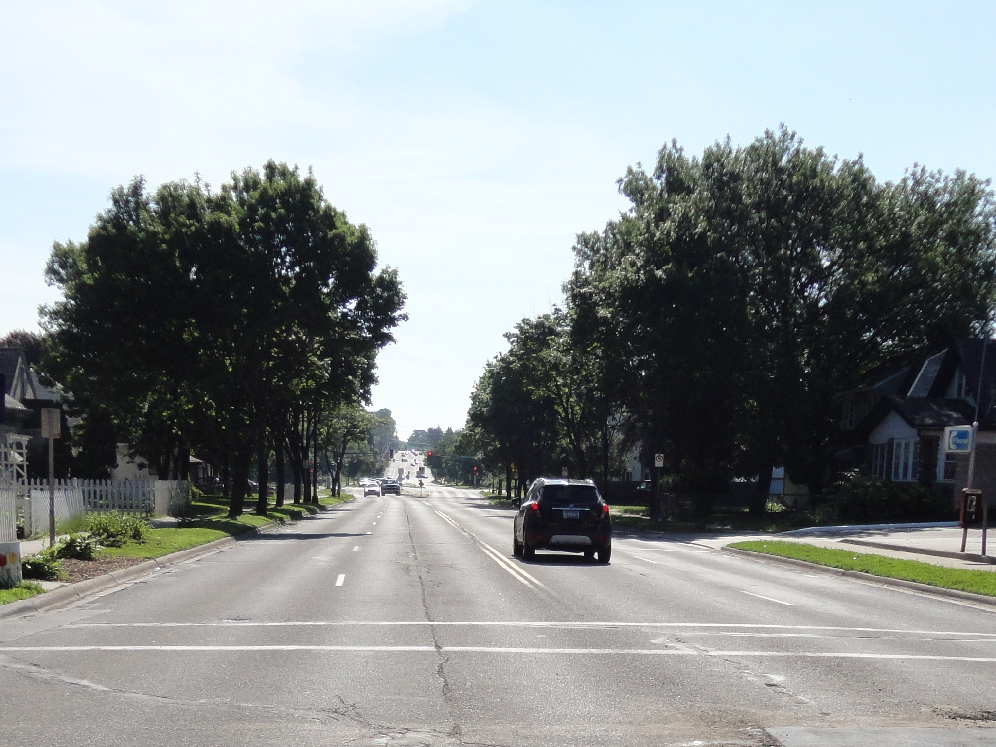 the road before reconstruction with four 10-foot lanes.